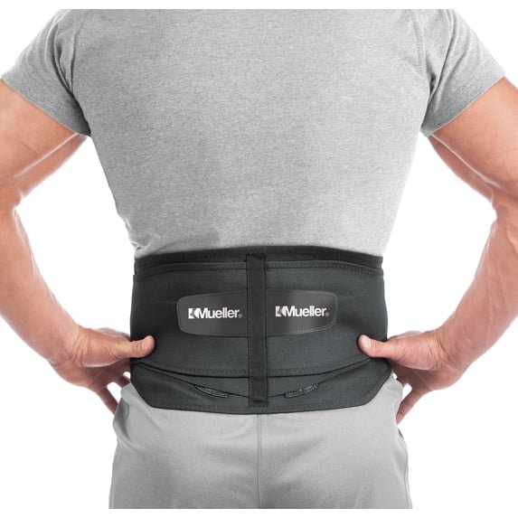 Mueller lumbar back brace with removable pad, black, worn back view